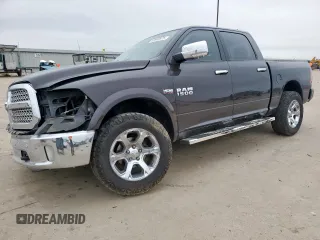 2017 Ram 1500 Laramie with VIN 1C6RR6NT5HS861393, listed as a Copart auction lot 58946975 with 114,801 mi miles and Salvage title. Bid and sale history available at DreamBid. Image 1.