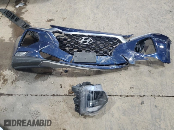 2019 Hyundai Santa Fe SEL z VIN 5NMS3CAD4KH076391, wystawiony jako Copart lot #53185365 z przebiegiem 85 517 mil mil oraz Szkoda całkowita • Salvage title. Historia ofert i sprzedaży dostępna na DreamBid. Obrazek 14.