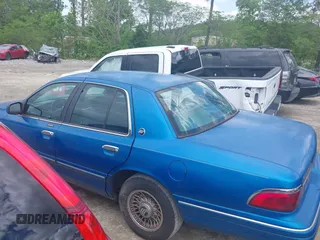 1996 Mercury Grand Marquis LS z VIN 2MELM75W0TX655576, wystawiony jako IAAI lot #42059805 z przebiegiem 46 837 mil mil oraz . Historia ofert i sprzedaży dostępna na DreamBid. Obrazek 14.