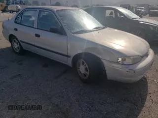 2001 Chevrolet Prizm z VIN 1Y1SK52811Z447352, wystawiony jako Copart lot #73916394 z przebiegiem 89 265 mil mil oraz Szkody całkowita. Historia ofert i sprzedaży dostępna na DreamBid. Obrazek 4.