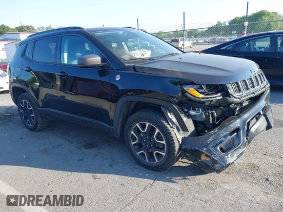 2019 Jeep Compass Trailhawk with VIN 3C4NJDDB5KT800515, listed as a IAAI auction lot 42059594 with 60,338 mi miles and . Bid and sale history available at DreamBid. Image 1.