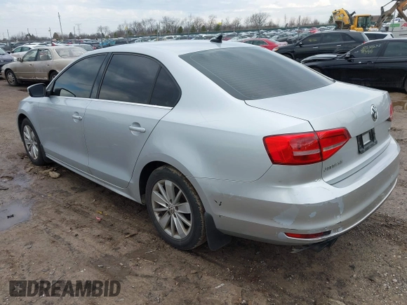2015 Volkswagen Jetta Sedan 1.8T SE with VIN 3VWD17AJ4FM302117, listed as a IAAI auction lot 41917138 with 122,946 mi miles. Bid and sale history available at carsss.com. Image 3.