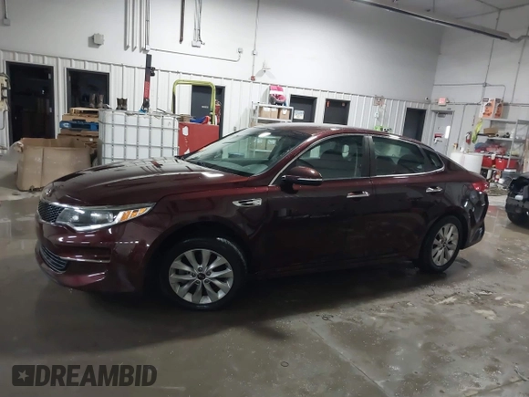2016 Kia Optima LX with VIN 5XXGT4L3XGG073744, listed as a IAAI auction lot 41586212 with 111,628 mi miles. Bid and sale history available at carsss.com. Image 14.