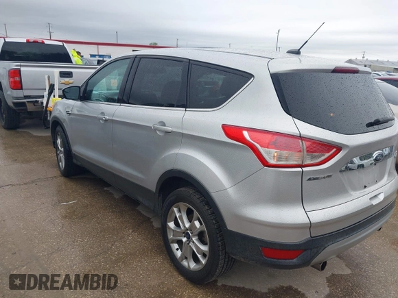 2013 Ford Escape SEL with VIN 1FMCU0H99DUC72013, listed as a IAAI auction lot 41952599 with 177,081 mi miles. Bid and sale history available at carsss.com. Image 3.