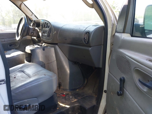 2004 Ford Econoline Cargo Commercial with VIN 1FTNE24W04HA50342, listed as a IAAI auction lot 42145274 with 158,408 mi miles and . Bid and sale history available at carsss.com. Image 5.