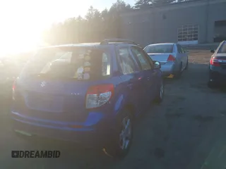 2012 Suzuki SX4 Crossover with VIN JS2YB5A34C6305897, listed as a IAAI auction lot 41176649 with 98,460 mi miles and . Bid and sale history available at DreamBid. Image 4.