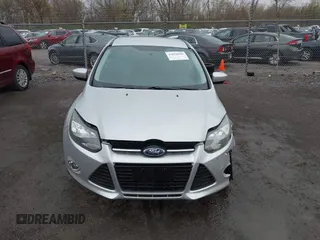 2012 Ford Focus SE z VIN 1FAHP3K27CL152803, wystawiony jako IAAI lot #42058556 z przebiegiem 181 717 mil mil oraz . Historia ofert i sprzedaży dostępna na DreamBid. Obrazek 12.