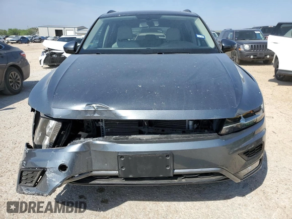 2018 Volkswagen Tiguan SEL with VIN 3VV3B7AX3JM010677, listed as a Copart auction lot 50615395 with 7,559 mi miles and Salvage Title. Bid and sale history available at DreamBid. Image 5.