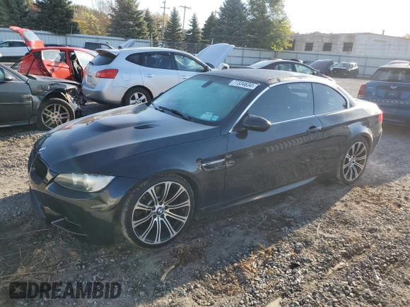 2013 BMW M3 with VIN WBSDX9C58DE785751, listed as a Copart auction lot 77334634 with 77,419 mi miles and Salvage Title. Bid and sale history available at carsss.com. Image 1.