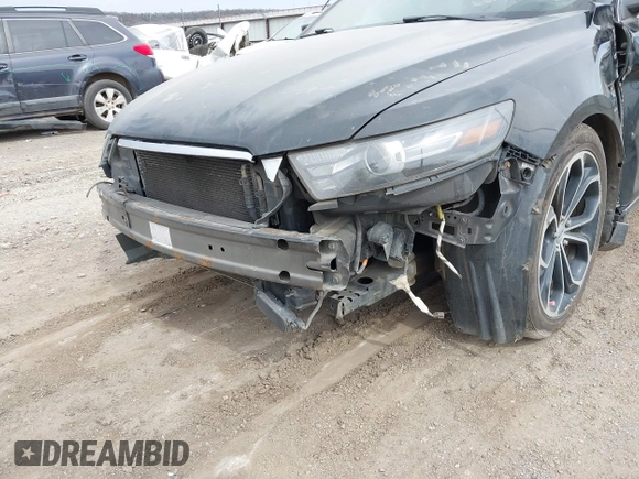 2013 Ford Taurus SHO z VIN 1FAHP2KT6DG174191, wystawiony jako IAAI lot #41752293 z przebiegiem 147 607 mil mil oraz . Historia ofert i sprzedaży dostępna na DreamBid. Obrazek 12.