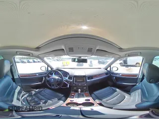 2014 Volkswagen Touareg Lux z VIN WVGEF9BP4ED011436, wystawiony jako Copart lot #74207144 z przebiegiem 207 059 mil mil oraz Szkoda całkowita • Salvage title. Historia ofert i sprzedaży dostępna na DreamBid. Obrazek 13.