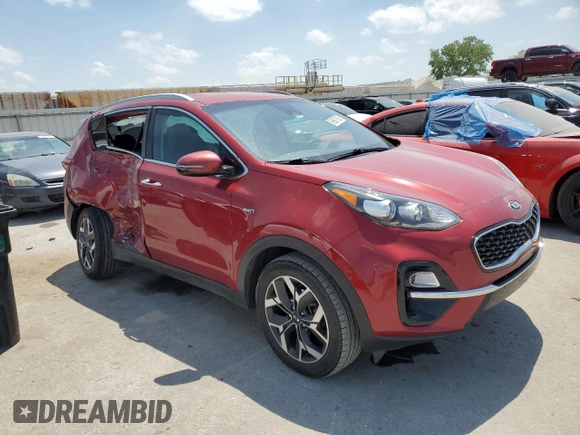 2020 Kia Sportage EX with VIN KNDPNCAC5L7708606, listed as a Copart auction lot 56987605 with 99,018 mi miles and Salvage title. Bid and sale history available at DreamBid. Image 4.