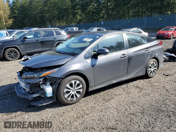 2021 Toyota Prius LE with VIN JTDKAMFP7M3185847, listed as a Copart auction lot 52897465 with 58,996 mi miles and Salvage Title. Bid and sale history available at DreamBid. Image 1.