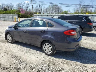 2012 Ford Fiesta SE with VIN 3FADP4BJ7CM157588, listed as a Copart auction lot 52411945 with 124,989 mi miles and Salvage Title. Bid and sale history available at carsss.com. Image 2.