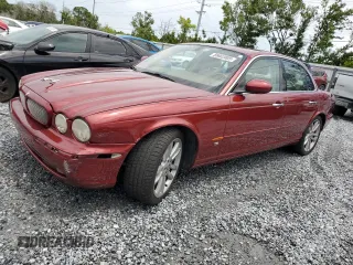 2005 Jaguar XJ R z VIN SAJWA73B45TG39179, wystawiony jako Copart lot #55662005 z przebiegiem 69 591 mil mil oraz Nie do naprawy • Non repairable. Historia ofert i sprzedaży dostępna na DreamBid. Obrazek 1.