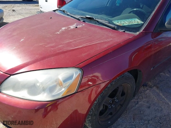 2009 Pontiac G6 w/1SA *Ltd Avail* with VIN 1G2ZG57B294166991, listed as a IAAI auction lot 41627583 with 142729 miles. Bid and sale history available at carsss.com. Image 6.