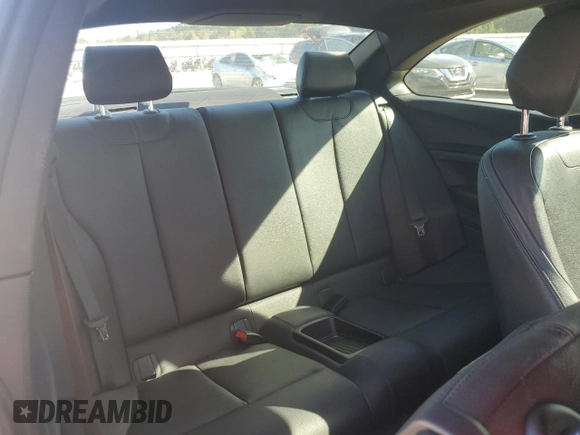 2016 BMW 2 Series M235i xDrive with VIN WBA1J9C50GV371750, listed as a Copart auction lot 74323344 with 92,512 mi miles and Clean Title. Bid and sale history available at carsss.com. Image 10.