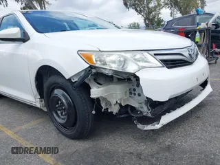 2014 Toyota Camry L with VIN 4T1BF1FK4EU403013, listed as a IAAI auction lot 42115089 with 221,686 mi miles and . Bid and sale history available at DreamBid. Image 6.