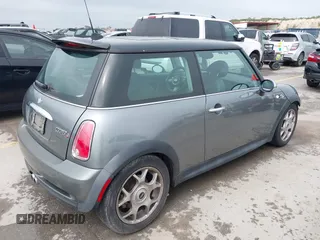 2006 MINI Hardtop S with VIN WMWRE33546TJ40154, listed as a IAAI auction lot 41924257 with 109,158 mi miles and . Bid and sale history available at DreamBid. Image 4.