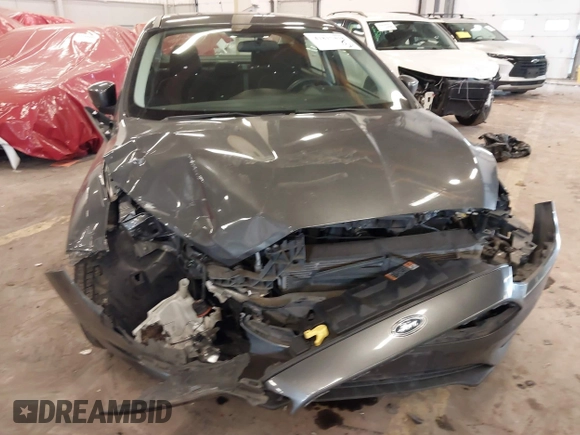2015 Ford Focus SE with VIN 1FADP3F2XFL201554, listed as a IAAI auction lot 41817418 with 101,938 mi miles. Bid and sale history available at carsss.com. Image 6.
