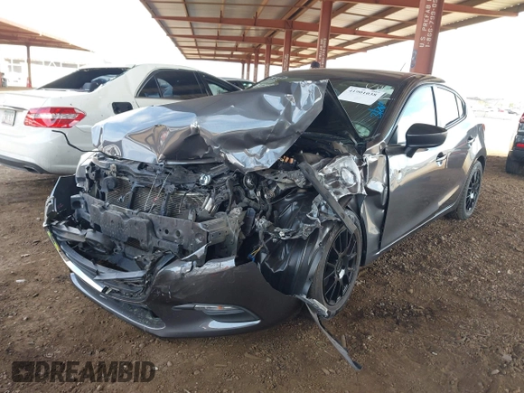 2018 Mazda 3 Sport with VIN 3MZBN1K73JM273472, listed as a IAAI auction lot 41901038 with 99,527 mi miles and . Bid and sale history available at DreamBid. Image 16.