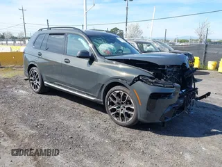 2024 BMW X7 xDrive40i with VIN 5UX23EM03R9T81356, listed as a IAAI auction lot 41872109 with 9,974 mi miles. Bid and sale history available at carsss.com. Image 1.