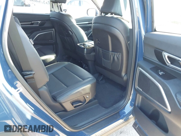 2025 Kia Telluride S with VIN 5XYP64GCXSG587826, listed as a IAAI auction lot 42065749 with 1,864 mi miles and . Bid and sale history available at DreamBid. Image 8.