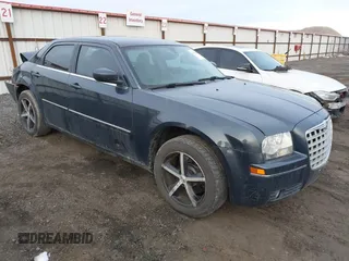 2007 Chrysler 300 Touring with VIN 2C3LK53G27H882957, listed as a IAAI auction lot 41350117 with 214,055 mi miles. Bid and sale history available at carsss.com. Image 1.