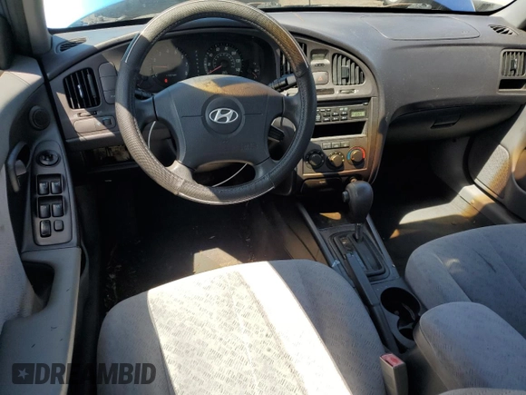 2005 Hyundai Elantra GLS z VIN KMHDN46D15U063723, wystawiony jako Copart lot #56113495 z przebiegiem 115 513 mil mil oraz Szkoda całkowita • Salvage title. Historia ofert i sprzedaży dostępna na DreamBid. Obrazek 8.
