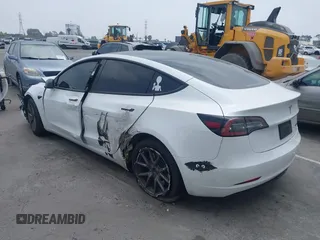 2023 Tesla Model 3 with VIN 5YJ3E1EA2PF417959, listed as a IAAI auction lot 42463853 with 22,736 mi miles and . Bid and sale history available at DreamBid. Image 3.