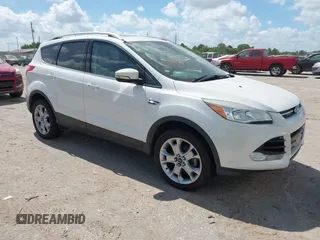 2015 Ford Escape Titanium with VIN 1FMCU0JX2FUB19274, listed as a IAAI auction lot 42809239 with 157,072 mi miles and . Bid and sale history available at DreamBid. Image 1.