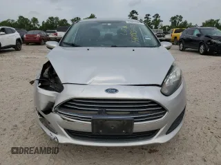 2014 Ford Fiesta S с VIN 3FADP4AJ6EM127809, выставлен на аукционе Copart как лот 54985085 с пробегом 136 257 миль миль и Списание • Salvage title. История ставок и продаж доступна на DreamBid. Изображение 5.
