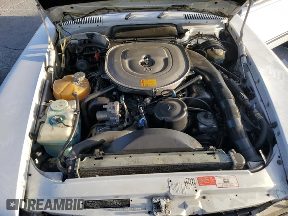 1989 Mercedes-Benz 560 Series 560SL with VIN WDBBA48D7KA100290, listed as a Copart auction lot 85049924 with 88,919 mi miles and Salvage Title. Bid and sale history available at carsss.com. Image 11.