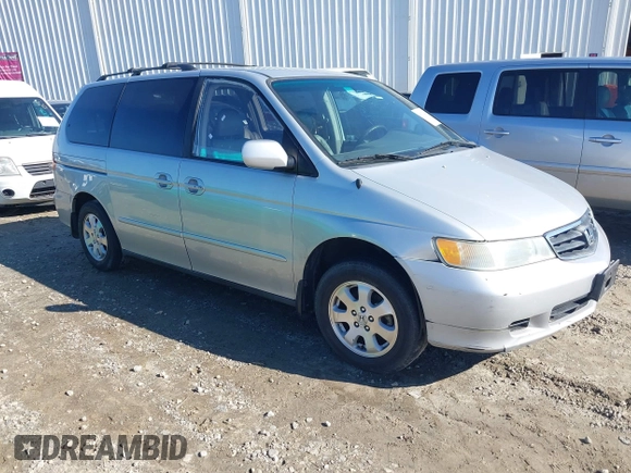 2004 Honda Odyssey EX-L with VIN 5FNRL18974B057715, listed as a IAAI auction lot 41762518 with 193,626 mi miles and . Bid and sale history available at DreamBid. Image 1.