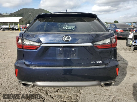2016 Lexus RX 350 with VIN 2T2ZZMCA8GC017083, listed as a Copart auction lot 51021285 with 76,155 mi miles and Salvage Title. Bid and sale history available at DreamBid. Image 6.