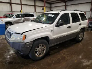 2004 Jeep Grand Cherokee Laredo with VIN 1J4GW48S14C414087, listed as a Copart auction lot 62091515 with 255,705 mi miles and Salvage title. Bid and sale history available at DreamBid. Image 1.