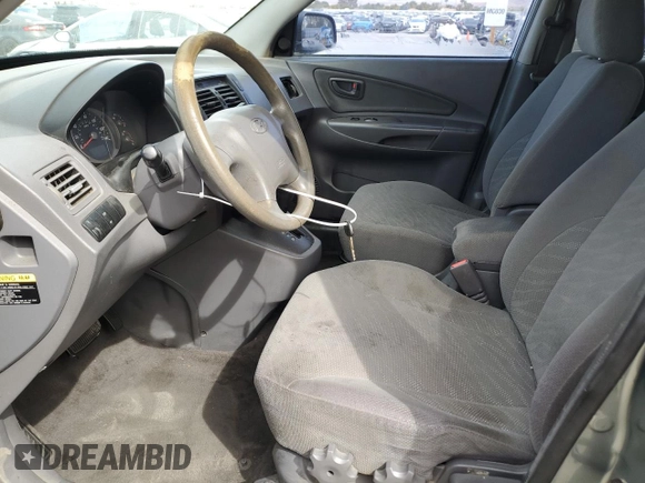 2005 Hyundai Tucson GL with VIN KM8JM12B95U080391, listed as a Copart auction lot 72551384 with 238,122 mi miles and Salvage Title. Bid and sale history available at carsss.com. Image 7.