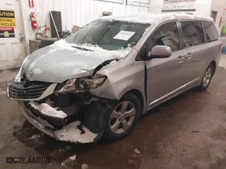 2014 Toyota Sienna LE AAS with VIN 5TDKK3DC4ES423340, listed as a IAAI auction lot 41609403 with 152,377 mi miles. Bid and sale history available at carsss.com. Image 2.