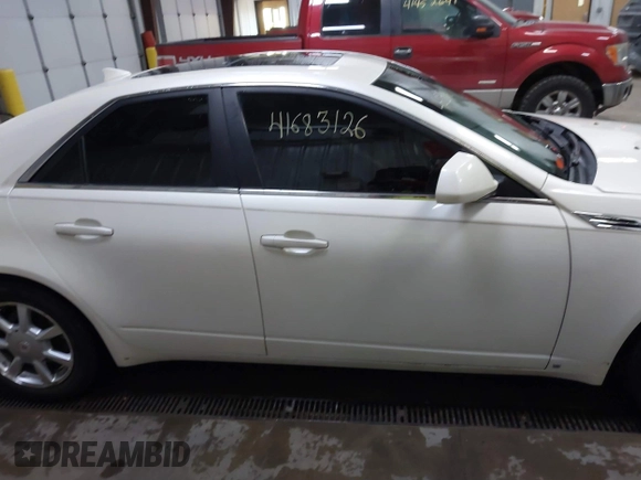 2009 Cadillac CTS AWD with VIN 1G6DH577490134942, listed as a IAAI auction lot 41683126 with 120,079 mi miles and . Bid and sale history available at DreamBid. Image 14.