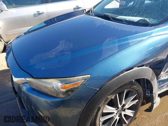 2018 Mazda CX-3 Touring z VIN JM1DKFC73J0301449, wystawiony jako IAAI lot #41678604 z przebiegiem 105 249 mil mil oraz . Historia ofert i sprzedaży dostępna na DreamBid. Obrazek 17.