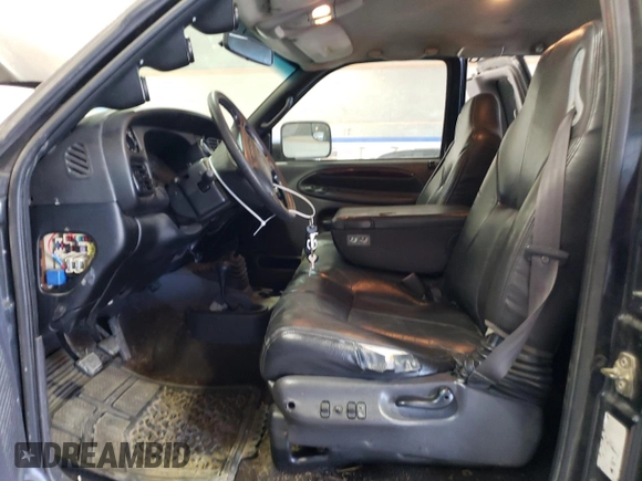 2002 Dodge Ram 2500 with VIN 3B7KF23C82M255391, listed as a Copart auction lot 73115584 with 216,242 mi miles and Salvage Title. Bid and sale history available at carsss.com. Image 7.