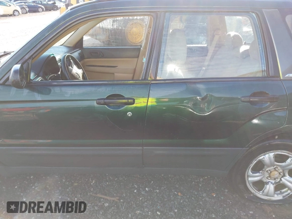 2003 Subaru Forester X with VIN JF1SG63673H757951, listed as a IAAI auction lot 41662103 with 168,433 mi miles. Bid and sale history available at carsss.com. Image 15.