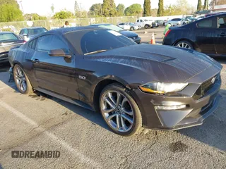 2023 Ford Mustang GT with VIN 1FA6P8CF3P5306777, listed as a IAAI auction lot 41820012 with 27,208 mi miles and . Bid and sale history available at DreamBid. Image 1.