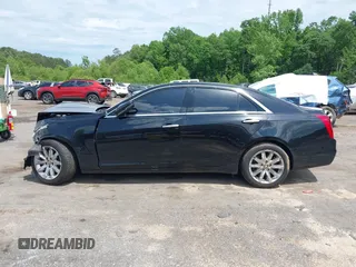 2016 Cadillac CTS AWD with VIN 1G6AW5SX7G0129019, listed as a IAAI auction lot 42148335 with 86,023 mi miles and . Bid and sale history available at DreamBid. Image 15.