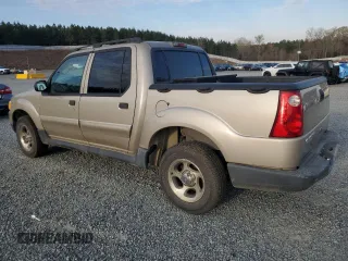2005 Ford Explorer Sport Trac XLS with VIN 1FMZU67K65UA65517, listed as a Copart auction lot 50827365 with 288,901 mi miles and Clean title. Bid and sale history available at DreamBid. Image 2.