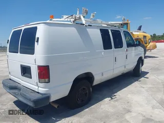 2010 Ford Econoline Cargo Commercial with VIN 1FTNE2EL1ADA10665, listed as a IAAI auction lot 41861433 with 183,657 mi miles and . Bid and sale history available at DreamBid. Image 4.