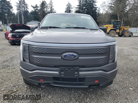 2023 Ford F-150 Lightning Pro with VIN 1FTVW1EL8PWG38419, listed as a Copart auction lot 47630535 with 11,940 mi miles and Salvage Title. Bid and sale history available at DreamBid. Image 5.