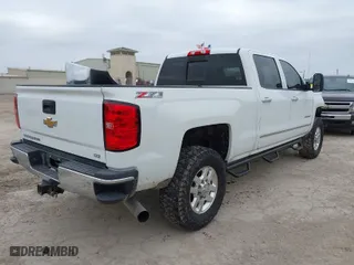2015 Chevrolet Silverado 2500HD LTZ with VIN 1GC1KWE89FF149299, listed as a IAAI auction lot 41565330 with 249,551 mi miles. Bid and sale history available at carsss.com. Image 4.