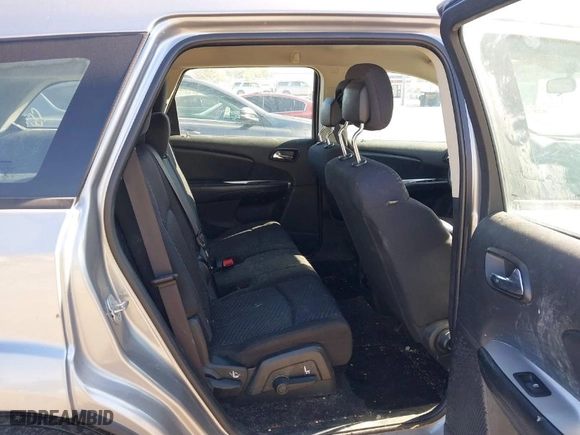 2015 Dodge Journey American Value Pkg with VIN 3C4PDCAB6FT700248, listed as a IAAI auction lot 40521023 with 82,629 mi miles. Bid and sale history available at carsss.com. Image 8.