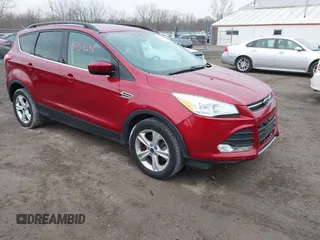 2014 Ford Escape SE with VIN 1FMCU9GX7EUC35483, listed as a IAAI auction lot 41704298 with 105,017 mi miles. Bid and sale history available at carsss.com. Image 1.